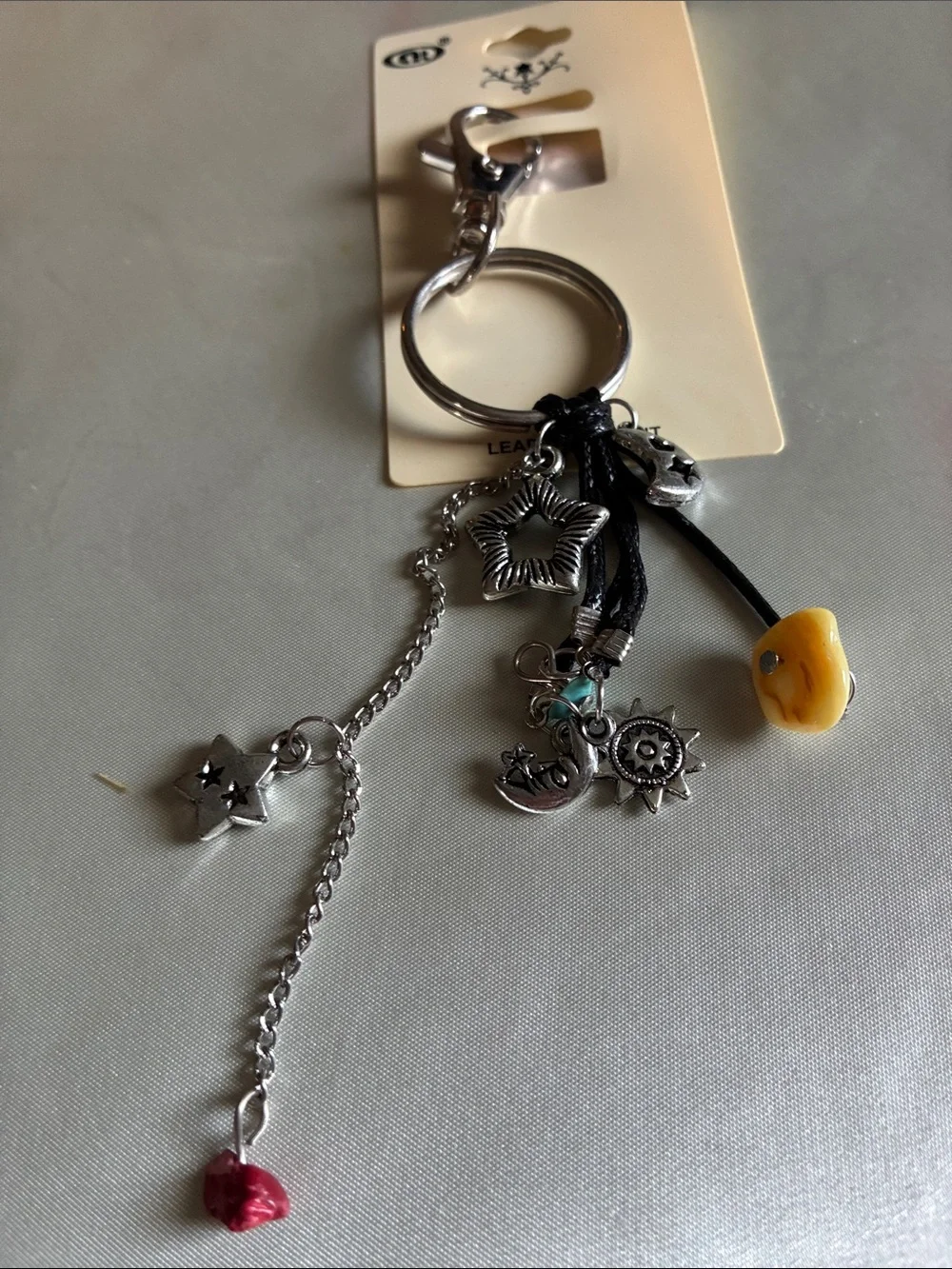 Silver Multi-Charm Star & Moon Keychain with Yellow Accent